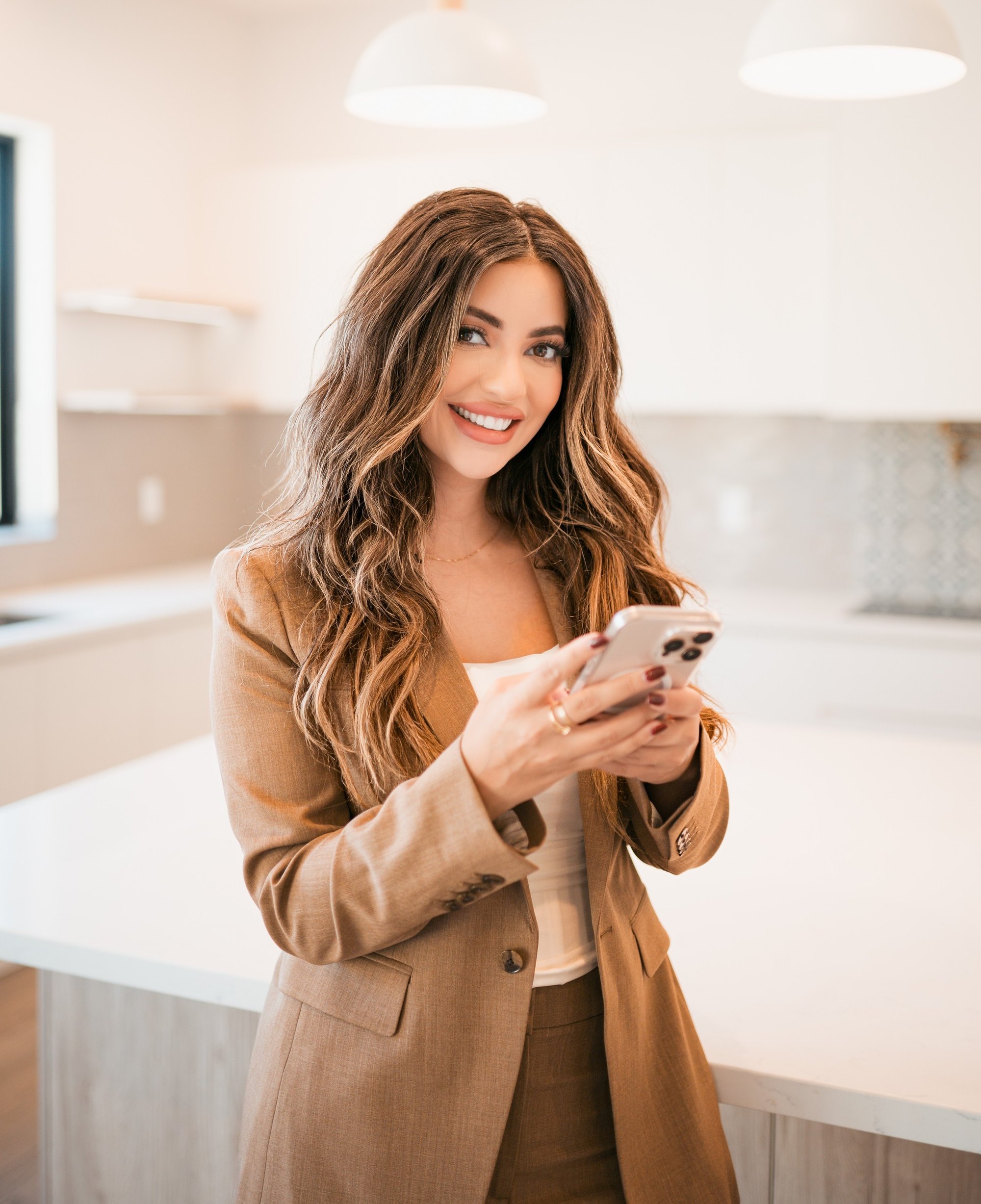 Sandra Ruelas in a bright modern kitchen